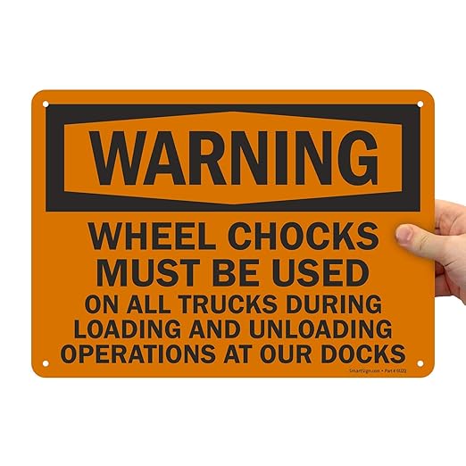 SmartSign "Warning - Wheel Chocks Must Be Used On All Trucks During Loading and Unloading Operations at Our Docks" Sign | 10" x 14" Plastic