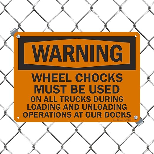 SmartSign "Warning - Wheel Chocks Must Be Used On All Trucks During Loading and Unloading Operations at Our Docks" Sign | 10" x 14" Plastic