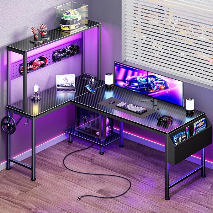PRAISUN L Shaped Gaming Desk with LED Lights & Power Outlets, Reversible Computer Desk with Storage Shelves & Bag, Large Corner Home Office Desk with Pegboard for Work from Home, Carbon Fiber Black