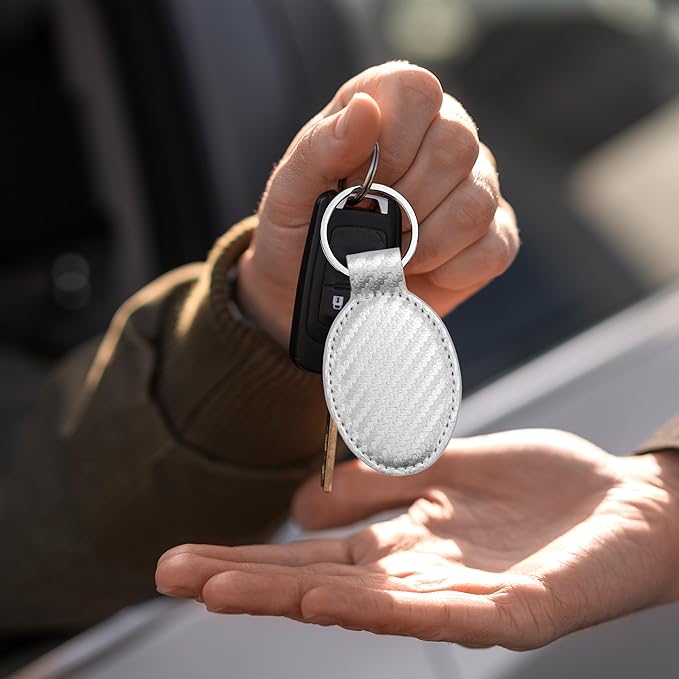 LaserGram Oval Keychain, Golfer Golfing, Personalized Engraving Included (Carbon Fiber Silver)