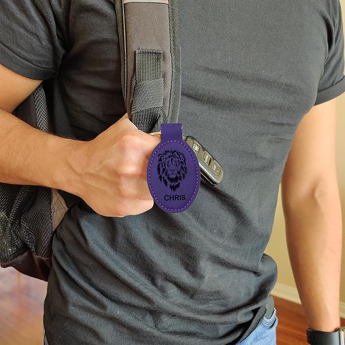 LaserGram Oval Keychain, Golfer Golfing, Personalized Engraving Included (Dark Purple)